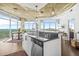 Stylish eat-in kitchen boasts an island, city views, and modern decor at 250 Pharr Ne Rd # 1618, Atlanta, GA 30305
