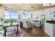 Bright open living room with city views, hardwood floors, and modern furnishings at 250 Pharr Ne Rd # 1618, Atlanta, GA 30305