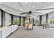 Spacious modern lounge area with billiards, dining tables, and comfortable seating at 250 Pharr Ne Rd # 1618, Atlanta, GA 30305