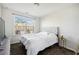 Inviting bedroom featuring a plush bed, soft lighting, and ample natural light at 3117 Haynes Park Dr, Lithonia, GA 30038