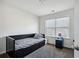 Cozy bedroom with a daybed, storage drawers, and neutral decor at 3117 Haynes Park Dr, Lithonia, GA 30038
