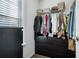 A well-organized closet with shelving, hanging racks, and drawers providing ample storage space at 3117 Haynes Park Dr, Lithonia, GA 30038