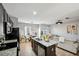 Bright open floor plan combining the kitchen, dining area, and living room at 3117 Haynes Park Dr, Lithonia, GA 30038