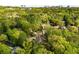 An aerial view of a suburban neighborhood with tree lined streets and wooded areas surrounding homes at 4201 Brookview Se Dr, Atlanta, GA 30339