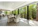 Spacious back porch featuring a dining area and string lights, perfect for relaxation at 4201 Brookview Se Dr, Atlanta, GA 30339