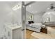 Bright ensuite bathroom featuring double vanity sinks and stylish decor with bedroom access at 4201 Brookview Se Dr, Atlanta, GA 30339