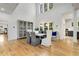 Elegant dining room with tall ceilings, large windows, and stylish furniture at 4201 Brookview Se Dr, Atlanta, GA 30339