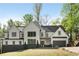 Charming two-story home with a well-manicured lawn and a classic design with modern colors at 4201 Brookview Se Dr, Atlanta, GA 30339