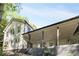 Back exterior of the home featuring a covered porch at 4201 Brookview Se Dr, Atlanta, GA 30339