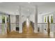 Open hallway with a fireplace and hardwood floors at 4201 Brookview Se Dr, Atlanta, GA 30339