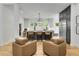 Modern kitchen with stainless steel appliances, a center island with seating, and stylish decor at 4201 Brookview Se Dr, Atlanta, GA 30339