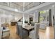 Bright living room with soaring ceilings, hardwood floors, large windows, and an open concept design at 4201 Brookview Se Dr, Atlanta, GA 30339