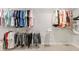 Organized walk-in closet with ample shelving and hanging space for clothing and accessories at 8050 Tristan Way, Whitesburg, GA 30185