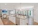 Spacious island kitchen with dining area and open view of the living room at 8050 Tristan Way, Whitesburg, GA 30185