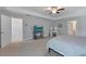 Bright and spacious main bedroom with a sitting area, TV, and a walk-in closet at 8050 Tristan Way, Whitesburg, GA 30185