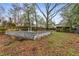 Large backyard showcasing a block foundation, with ample space for landscaping and outdoor activities at 1007 Blue Ridge Ne Ave, Atlanta, GA 30306