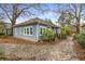 Exterior view of home with blue siding, nice yard and cobblestone driveway at 1007 Blue Ridge Ne Ave, Atlanta, GA 30306