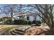 Inviting exterior view of a home with a covered porch and well-maintained landscaping, showcasing its charm at 1007 Blue Ridge Ne Ave, Atlanta, GA 30306