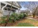 Street view of a home with a classic front porch, complemented by mature landscaping and a sidewalk at 1007 Blue Ridge Ne Ave, Atlanta, GA 30306