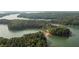 Gorgeous aerial view of Lake Lanier featuring tree covered islands and crystal clear water at 516 Healy Dr # 69, Cumming, GA 30040