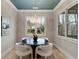 Cozy dining area with modern chandelier, neutral walls, and bright natural light at 662 Timm Valley Ne Rd, Atlanta, GA 30305