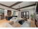 Spacious open-concept area features a fireplace, seamless flow to kitchen, and exterior access at 662 Timm Valley Ne Rd, Atlanta, GA 30305