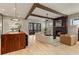 Open-concept living room with hardwood floors, fireplace, and stylish furniture at 662 Timm Valley Ne Rd, Atlanta, GA 30305