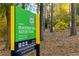 Peachtree Park Nature Trail sign and trail head in a wooded area at 662 Timm Valley Ne Rd, Atlanta, GA 30305