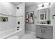 Modern bathroom boasts sleek tile work, contemporary fixtures, and vanity storage at 985 Columbia Dr, Decatur, GA 30030