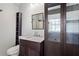 Bathroom featuring granite countertop vanity and access to shower-tub combo at 1297 Quail Hunt Dr, Riverdale, GA 30296