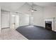 The living room has tile flooring and is next to the fireplace at 1297 Quail Hunt Dr, Riverdale, GA 30296