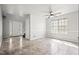 This open living room area features large windows and tile flooring at 1297 Quail Hunt Dr, Riverdale, GA 30296