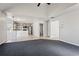 This living area flows into an eat-in kitchen and offers gray scale paint at 1297 Quail Hunt Dr, Riverdale, GA 30296