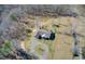 Aerial view of the property showcasing the home's layout and surrounding land at 1603 Drowning Creek Rd, Dacula, GA 30019