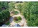 Aerial view of a circular driveway and landscaped grounds at 1603 Drowning Creek Rd, Dacula, GA 30019