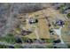 Wide aerial view showcasing the location of the property relative to surrounding homes and roads at 1603 Drowning Creek Rd, Dacula, GA 30019