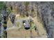 Overhead view highlighting the home's placement on the lot and surrounding landscape at 1603 Drowning Creek Rd, Dacula, GA 30019