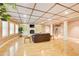 Finished basement featuring hardwood floors, fireplace and large entertainment area at 1603 Drowning Creek Rd, Dacula, GA 30019