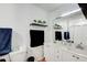 Bright bathroom with dual sinks, white cabinets, and modern fixtures for a clean and stylish space at 1603 Drowning Creek Rd, Dacula, GA 30019
