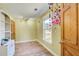 Cozy bedroom with hardwood floors, bright window, and ample natural light at 1603 Drowning Creek Rd, Dacula, GA 30019