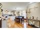 Open concept with view of dining room, chandelier, and adjacent kitchen space at 1603 Drowning Creek Rd, Dacula, GA 30019