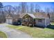 Inviting home with a two-car garage, front porch, and well-manicured lawn at 1603 Drowning Creek Rd, Dacula, GA 30019