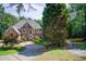 Stately brick home with a well-maintained front yard and circular driveway at 1603 Drowning Creek Rd, Dacula, GA 30019