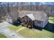 Well-maintained home with a welcoming front porch and a beautiful lawn at 1603 Drowning Creek Rd, Dacula, GA 30019