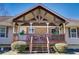 Charming porch with stone details and an inviting entrance at 1603 Drowning Creek Rd, Dacula, GA 30019