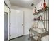 Hallway features a glass top table and a beautiful wine rack at 1603 Drowning Creek Rd, Dacula, GA 30019