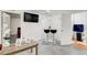 Hallway features a stylish bar setup and access to a bathroom at 1603 Drowning Creek Rd, Dacula, GA 30019