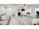 Spacious living room with modern decor and lots of natural light at 1603 Drowning Creek Rd, Dacula, GA 30019
