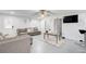 Spacious living room with modern decor and a mounted flat screen TV at 1603 Drowning Creek Rd, Dacula, GA 30019