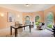 Bright office space with large arched windows and elegant decor at 1603 Drowning Creek Rd, Dacula, GA 30019